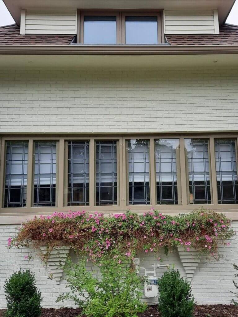 Newly installed storm windows on a house in Shorewood